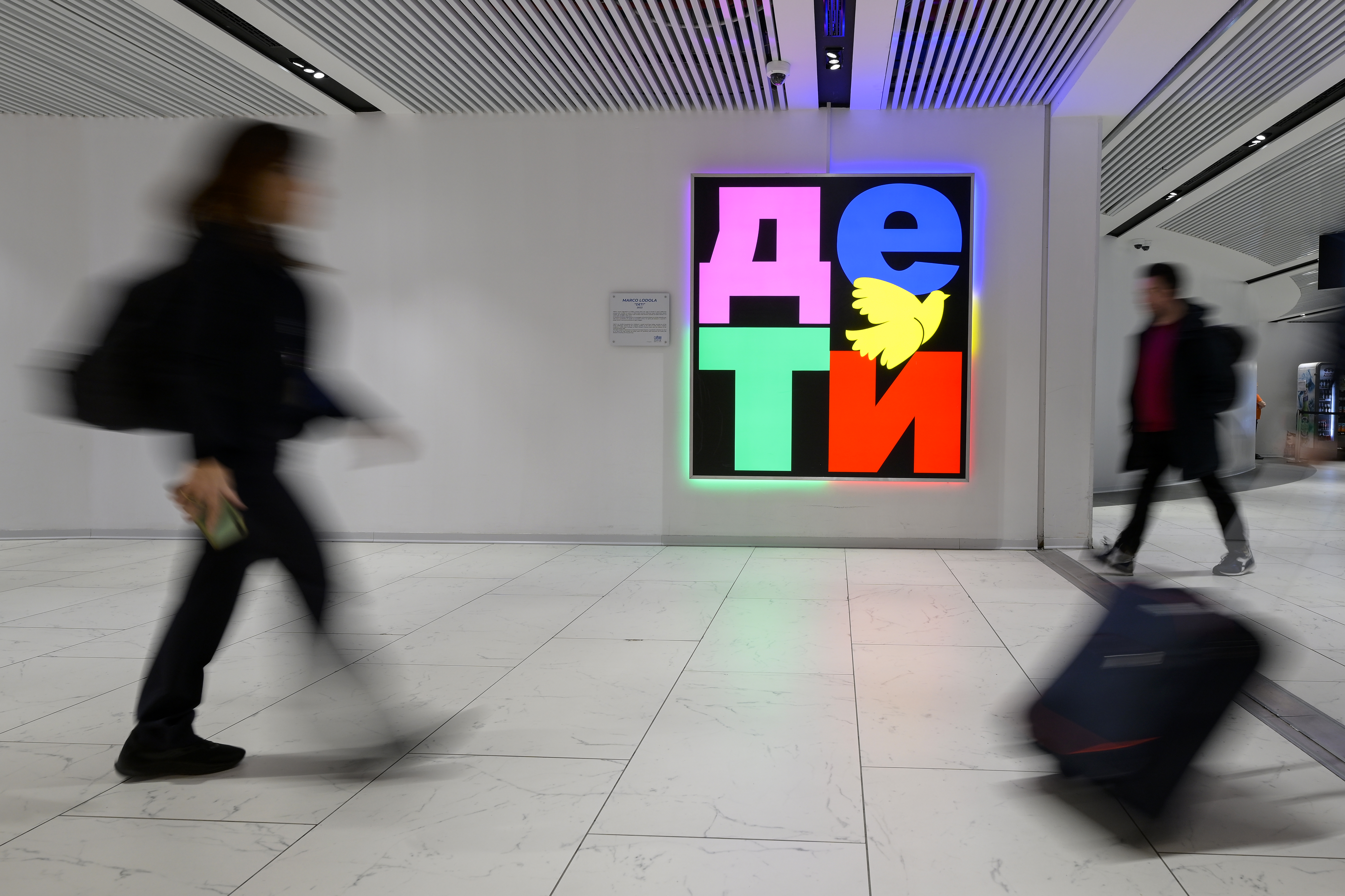 Light-based art installation with colorful letters